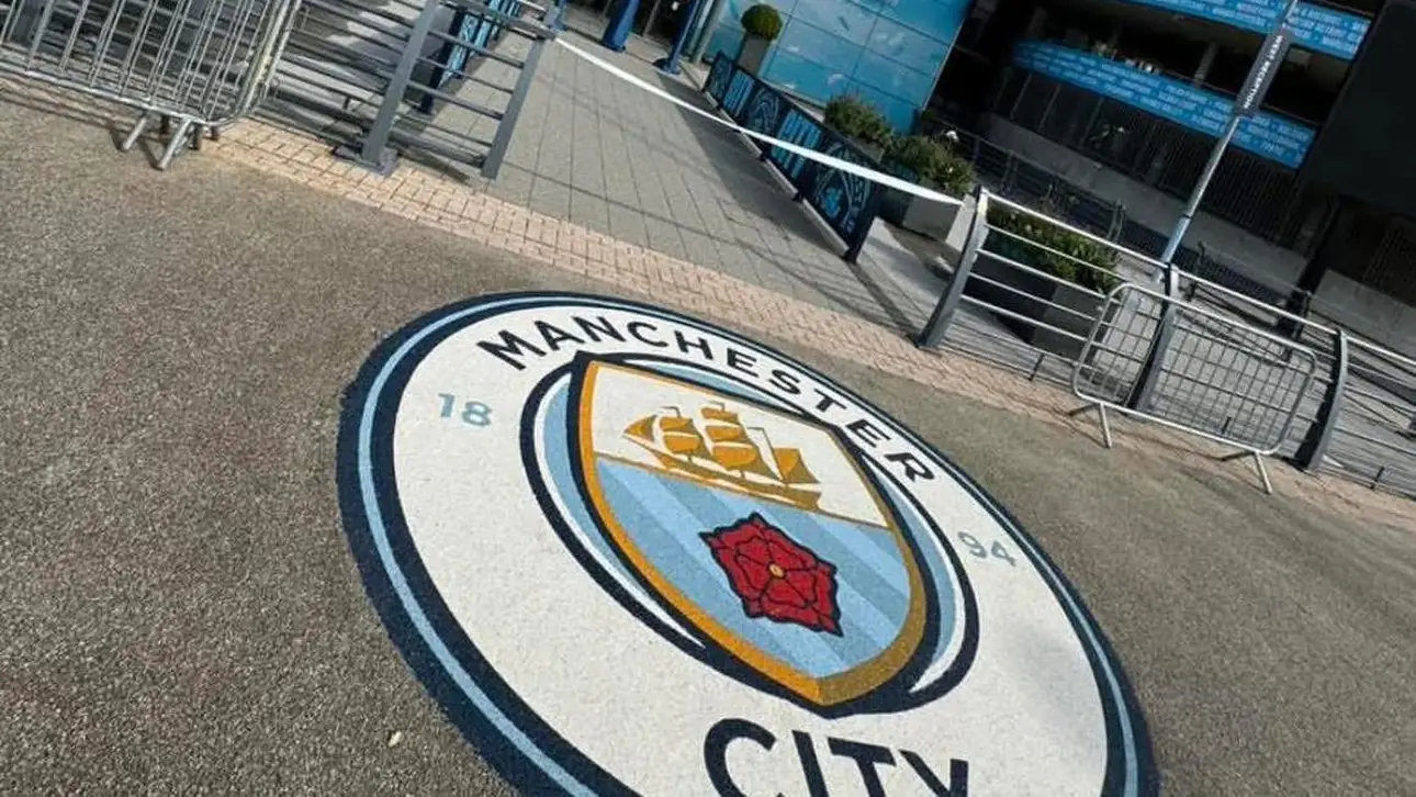 Manchester City crest laid in resin bound stone by T&A Resin at the Etihad Stadium